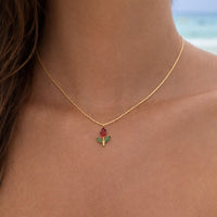 Rooted in Shine gold-plated Tulip Necklace with red-stone pendant, close-up