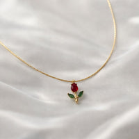 Rooted in Shine gold-plated Tulip Necklace with red-stone pendant, styled shot
